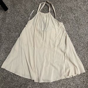 Strappy back flowy dress. New with tags.